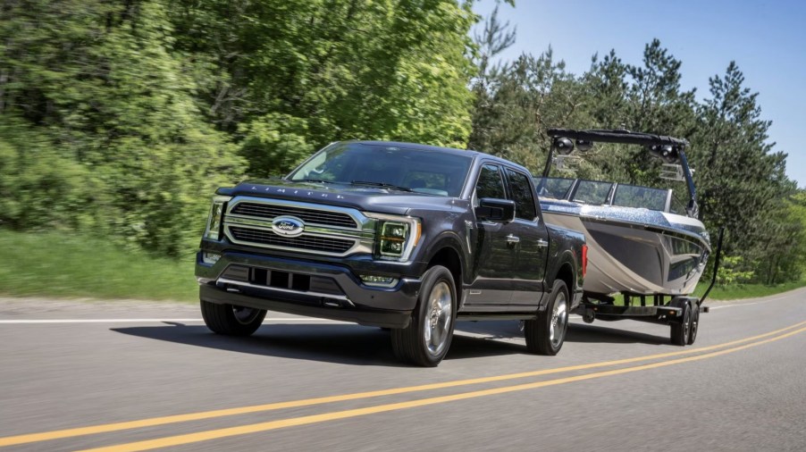 The 2024 Ford F-150 Hybrid towing a boat