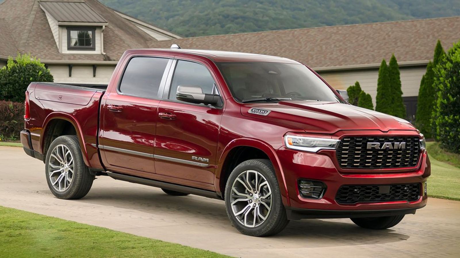 Red 2025 Ram 1500 Tungsten Parked in a Driveway.