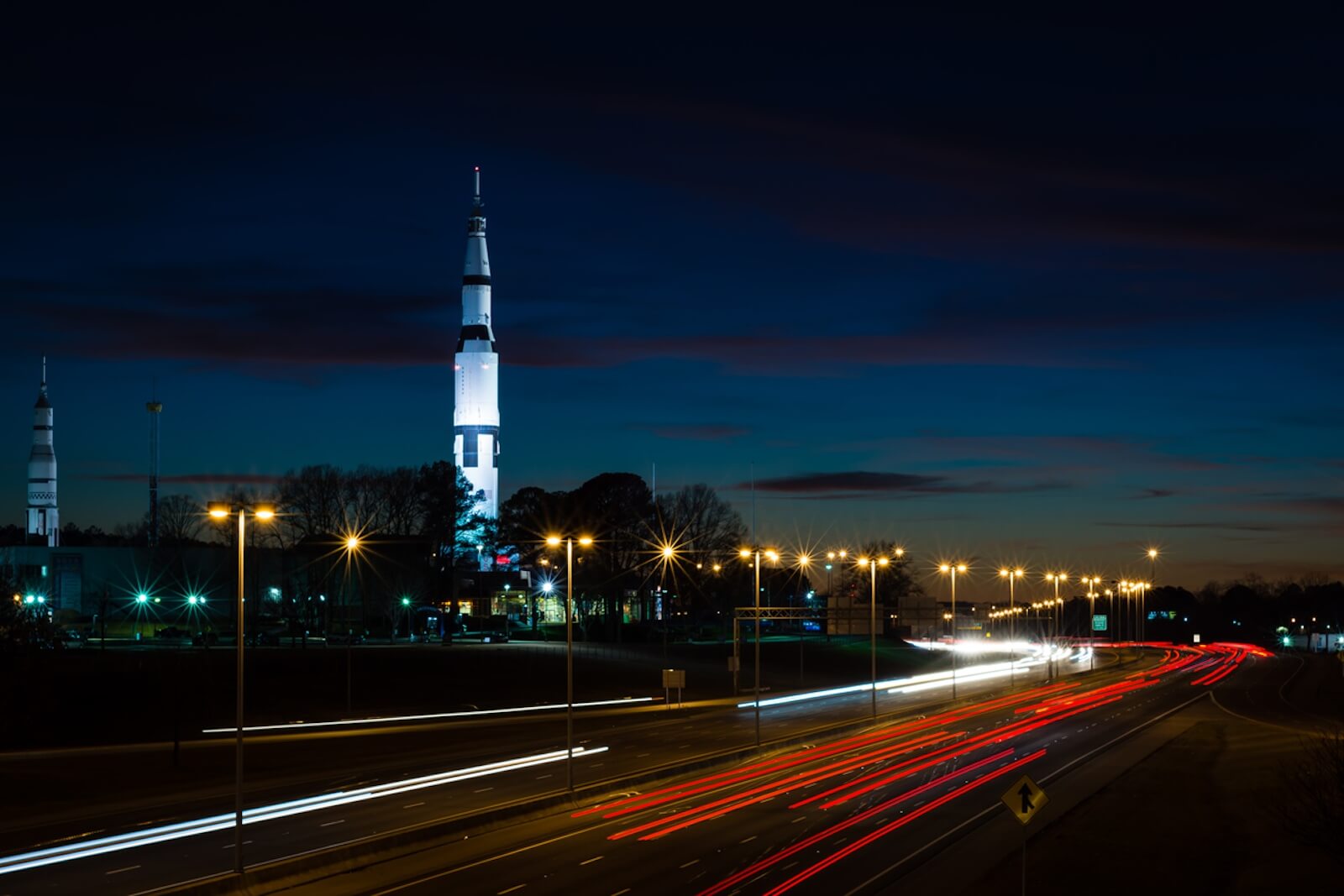 A Saturn V rocket at a museum in Alabama alongside the highway. 