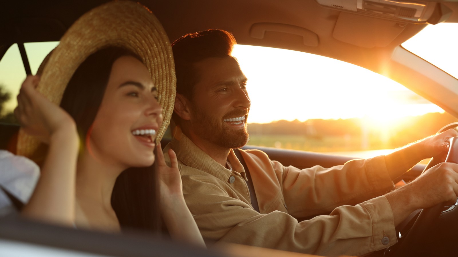 Happy Couple Driving Together