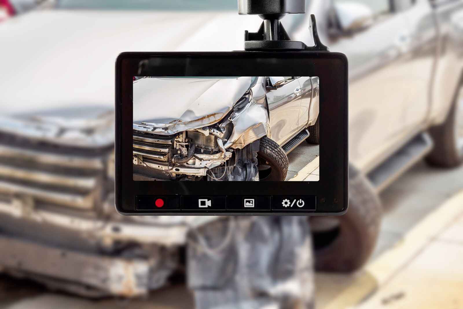Dash cam recording a car crash wrecked vehicle