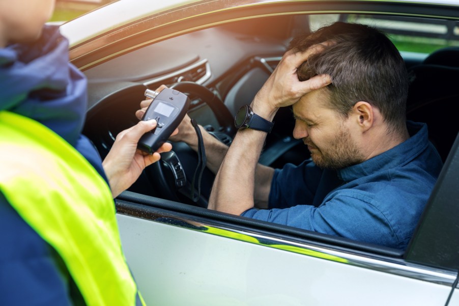 A man getting a breathalyzer test