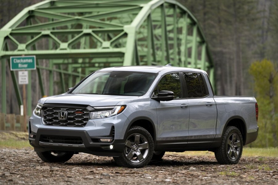 The 2024 Honda Ridgeline parked near a bridge