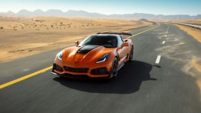 An orange 2019 Chevrolet Corvette ZR1 blasts across the desert.
