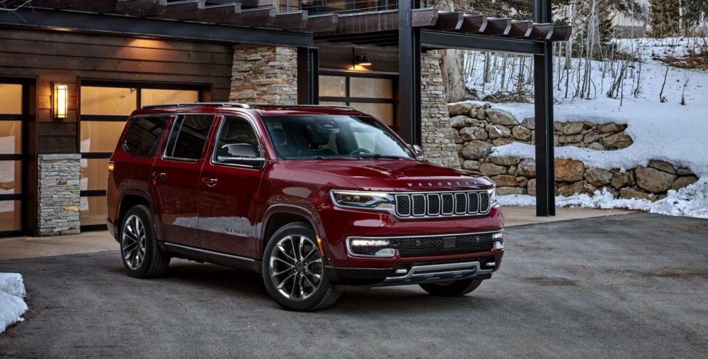 The 2024 Jeep Wagoneer parked near a home