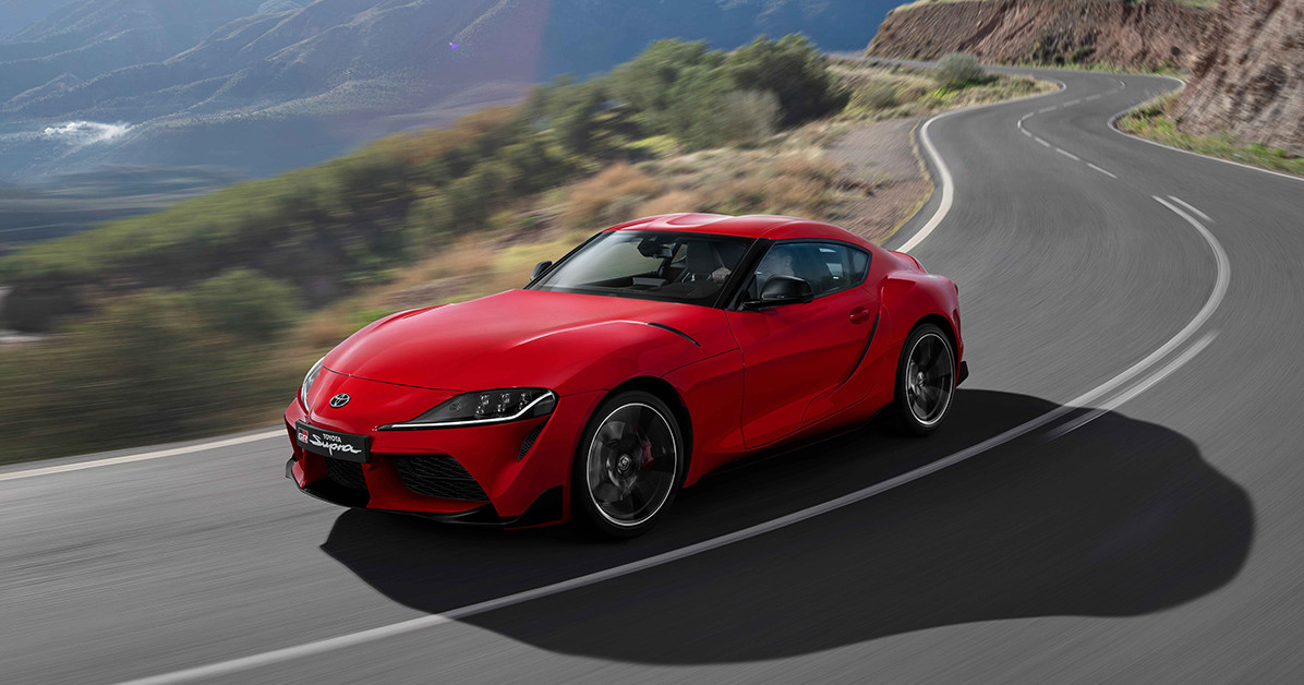 The 2024 Toyota Supra on a curvy road