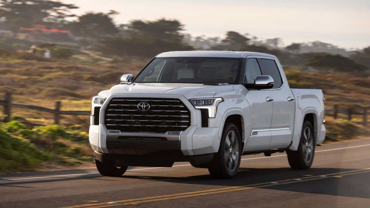 The 2024 Toyota Tundra driving on the road 