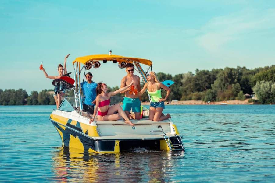 People drinking on a boat during the summer