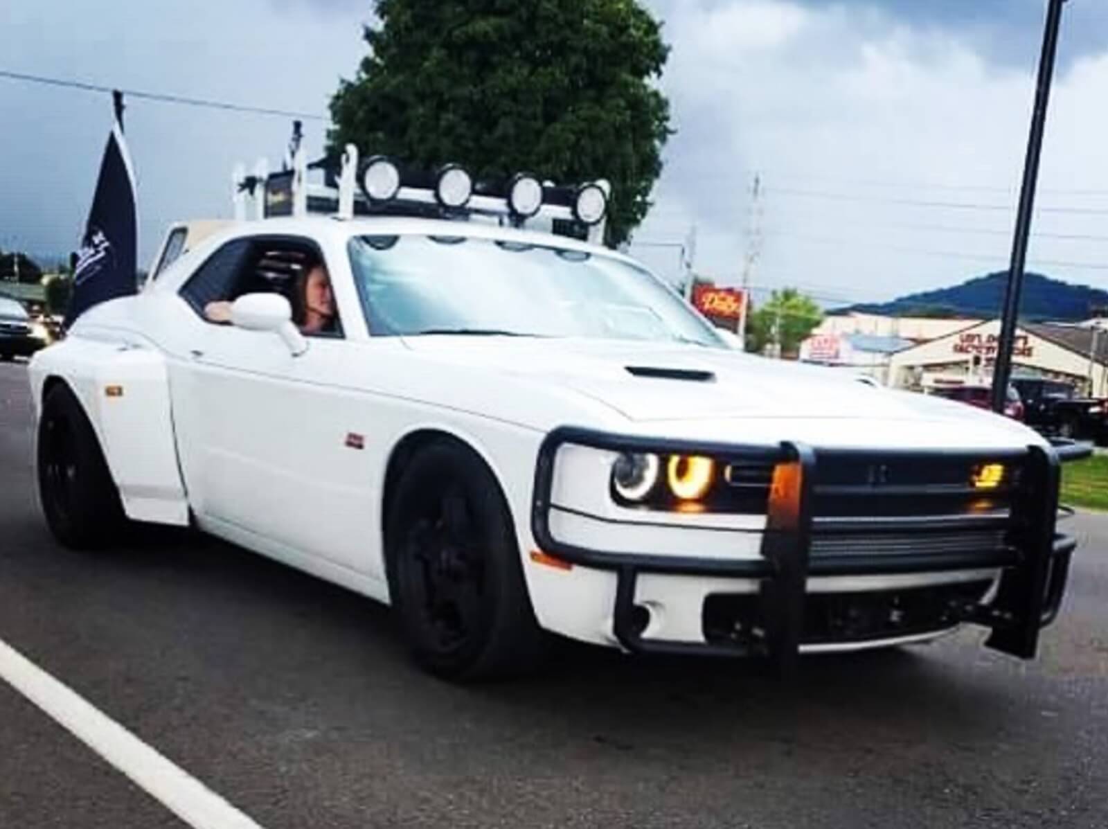 A custom Dodge Challenger Widebody dually build at an event. 
