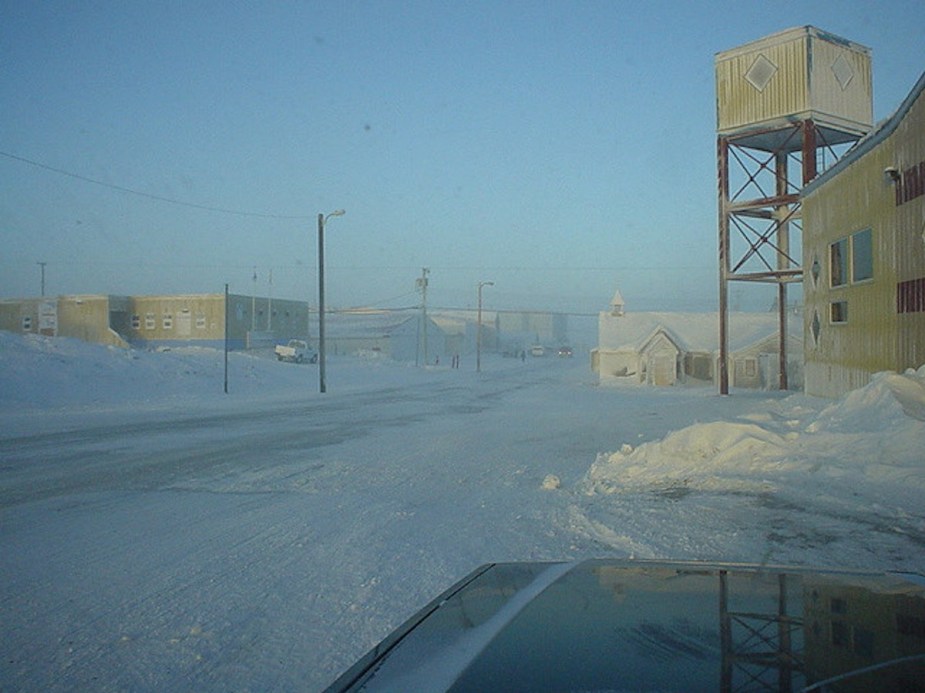 Empty windblown street in a snowy town on the Canadian Tundra