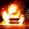 A car on fire on the highway