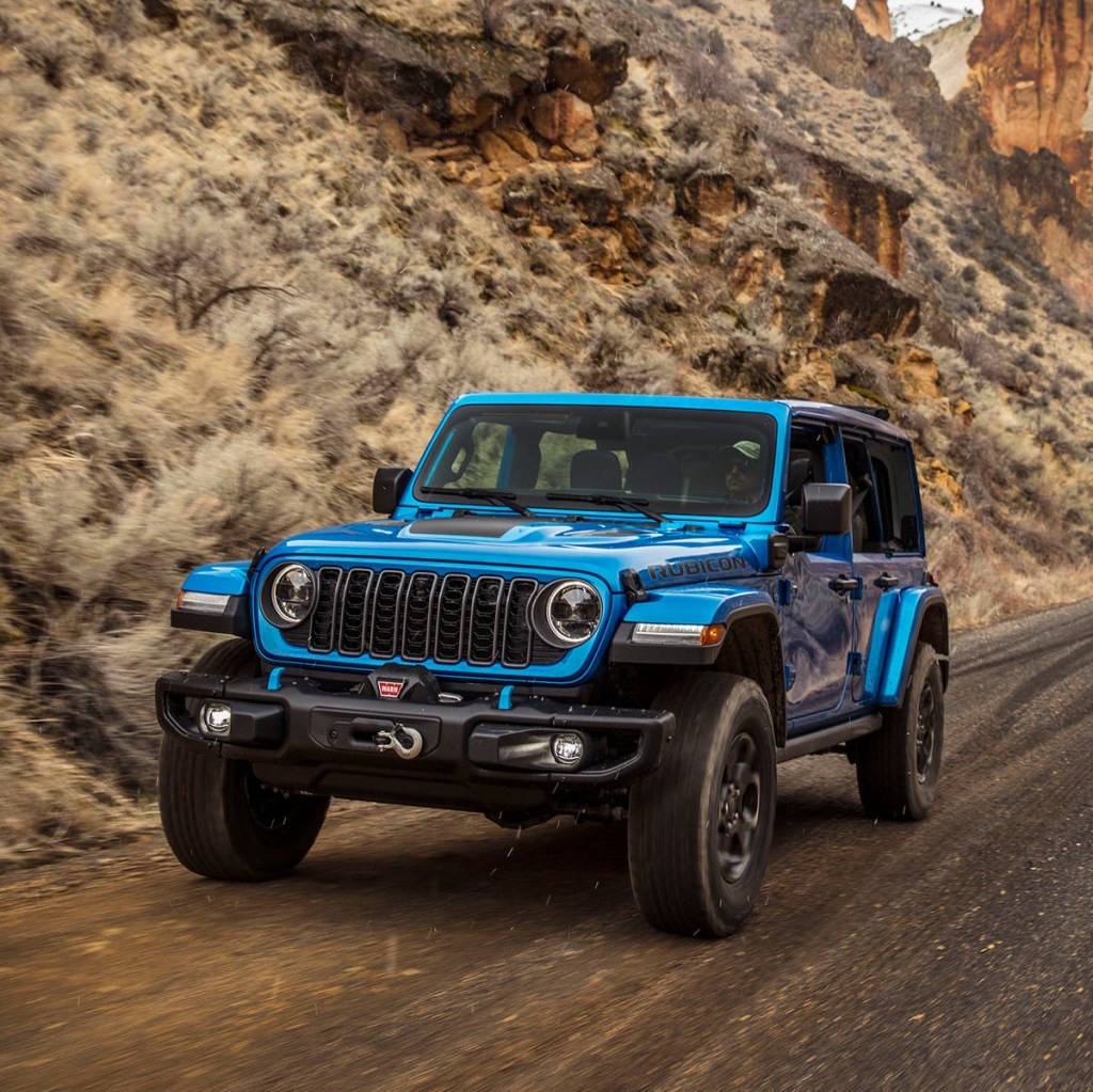 The 2024 Jeep Wrangler on a dirt road