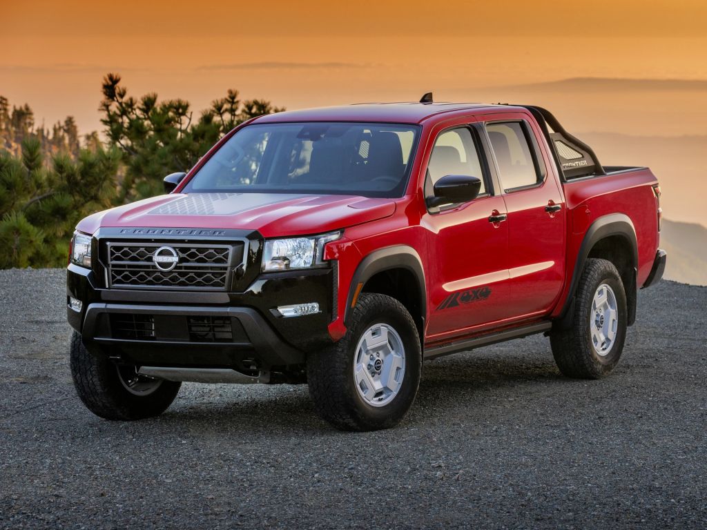 The 2024 Nissan Frontier parked on gravel