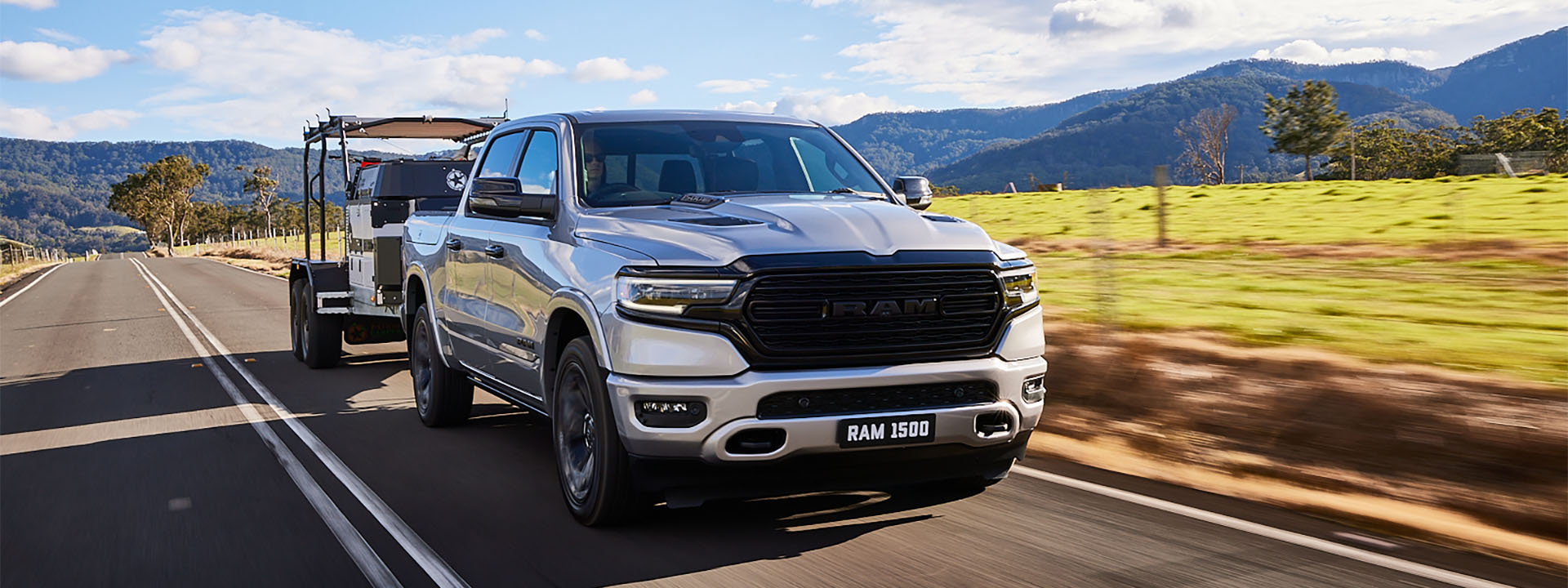 The 2024 Ram 1500 towing a trailer