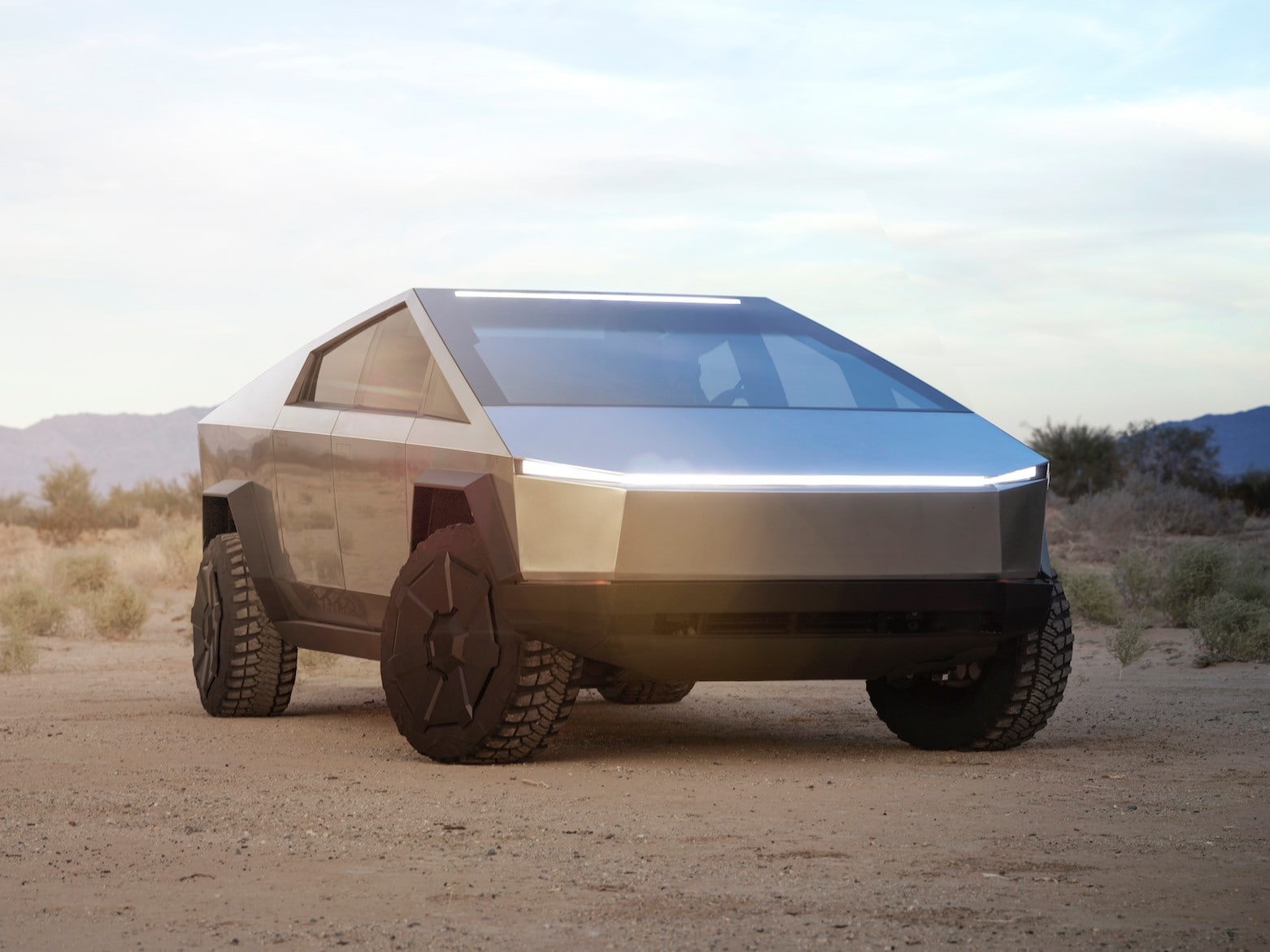 The Tesla Cybertruck trying to off-road in dirt