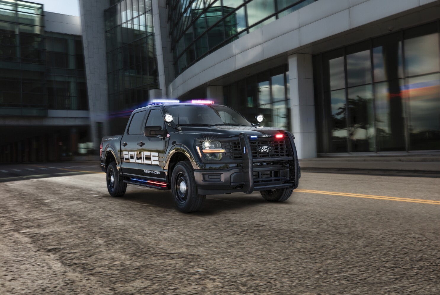 A Ford F-150 police inceptor on the road