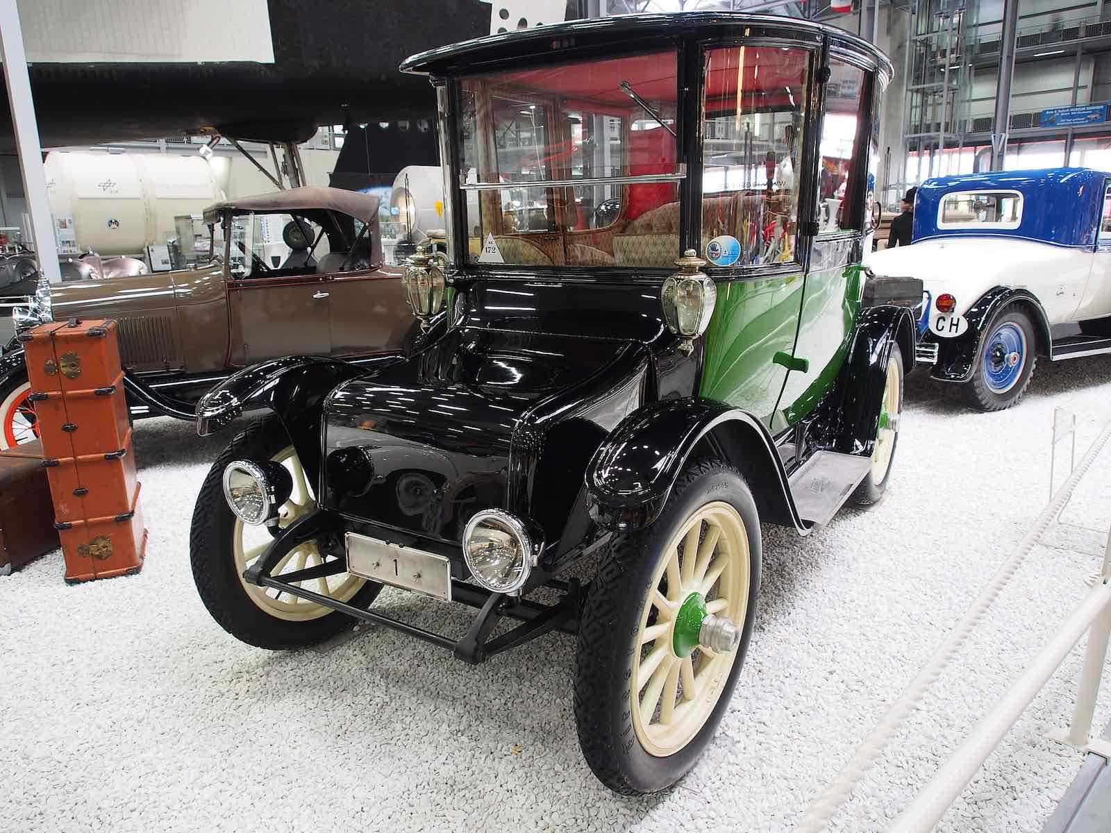 Green Detroit electric coupe.