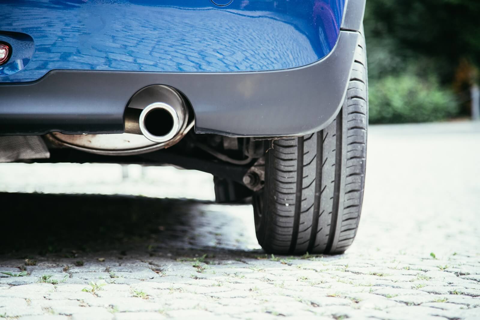 A car shows off its tailpipe, the portion rearward of the catalytic converter.