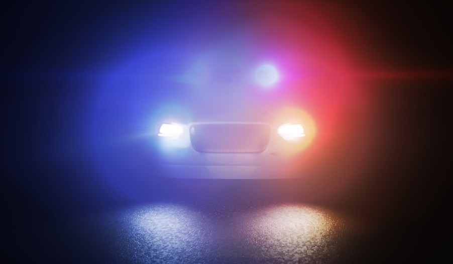 The blue and red lights atop an unmarked police car.