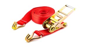 Red-orange ratchet strap with gold hardware on a white background