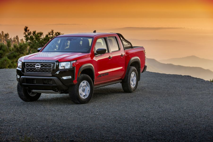 The 2024 Nissan Frontier parked at the top of a mountain
