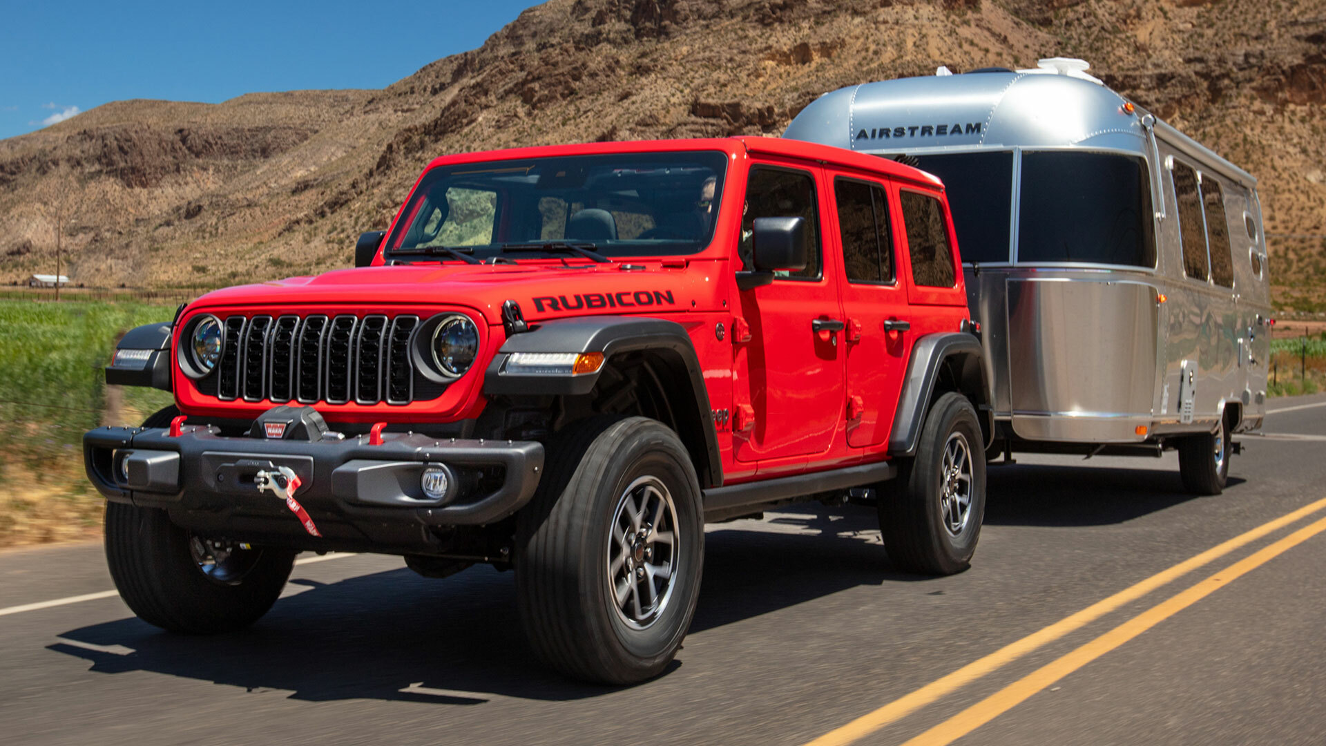 The 2025 Jeep Wrangler towing a trailer 