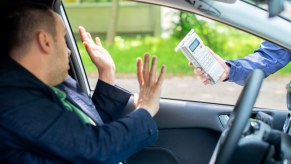 Driver refuses a breathalyzer test administered by a police officer.