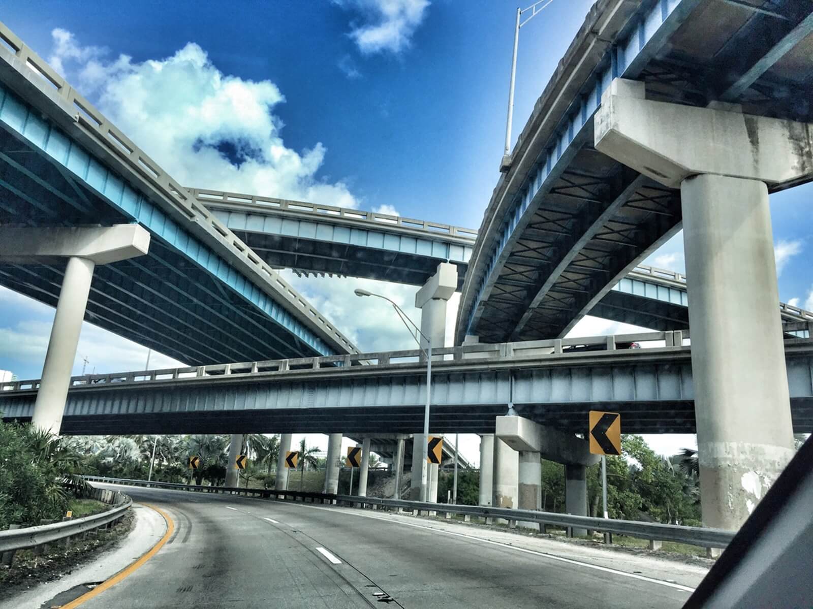 Overpass Rd Passengers survive after their car crashes off of a Miami overpass onto ...