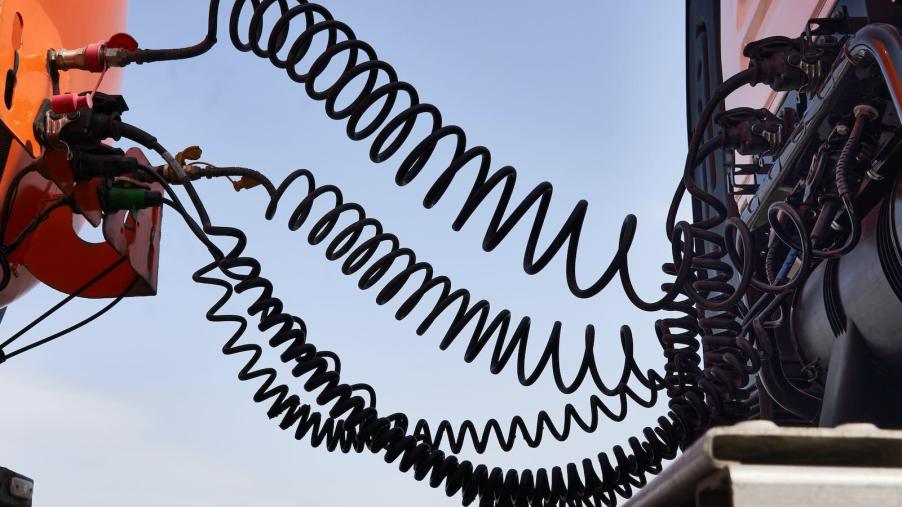 Why do semi trucks have all those hoses connecting the cab and trailer?