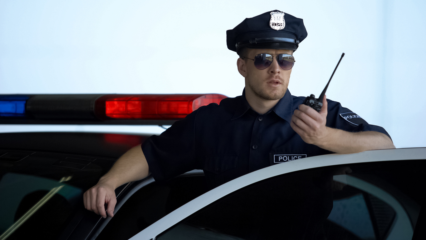 A cop using his radio