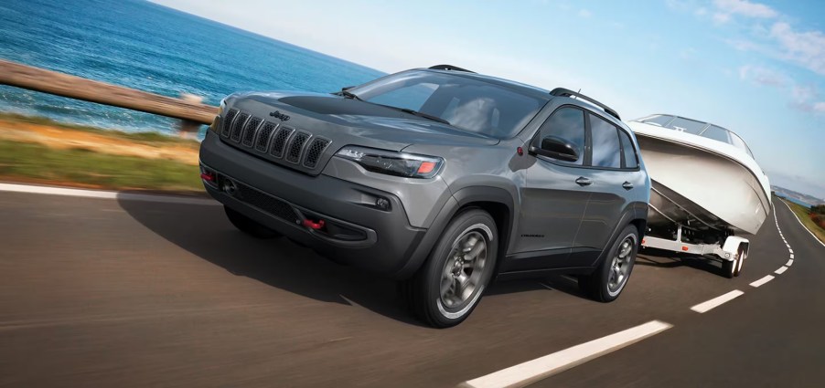 The 2023 Jeep Cherokee towing a boat