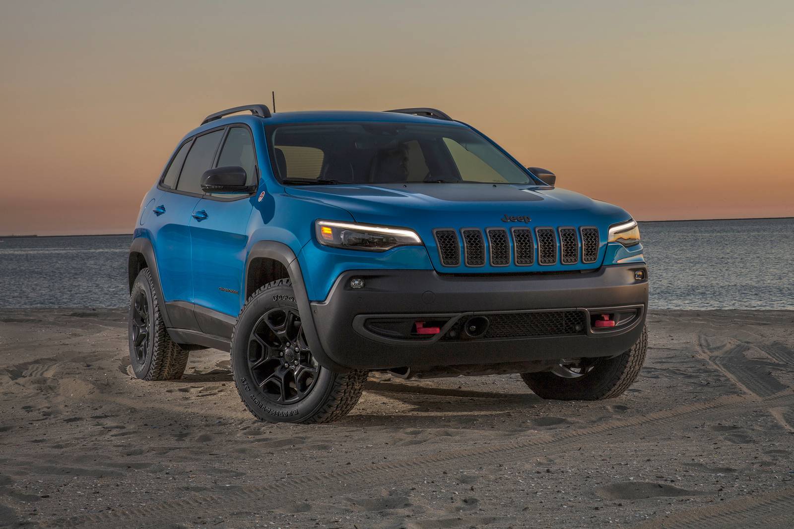 The 2023 Jeep Cherokee parked on the beach