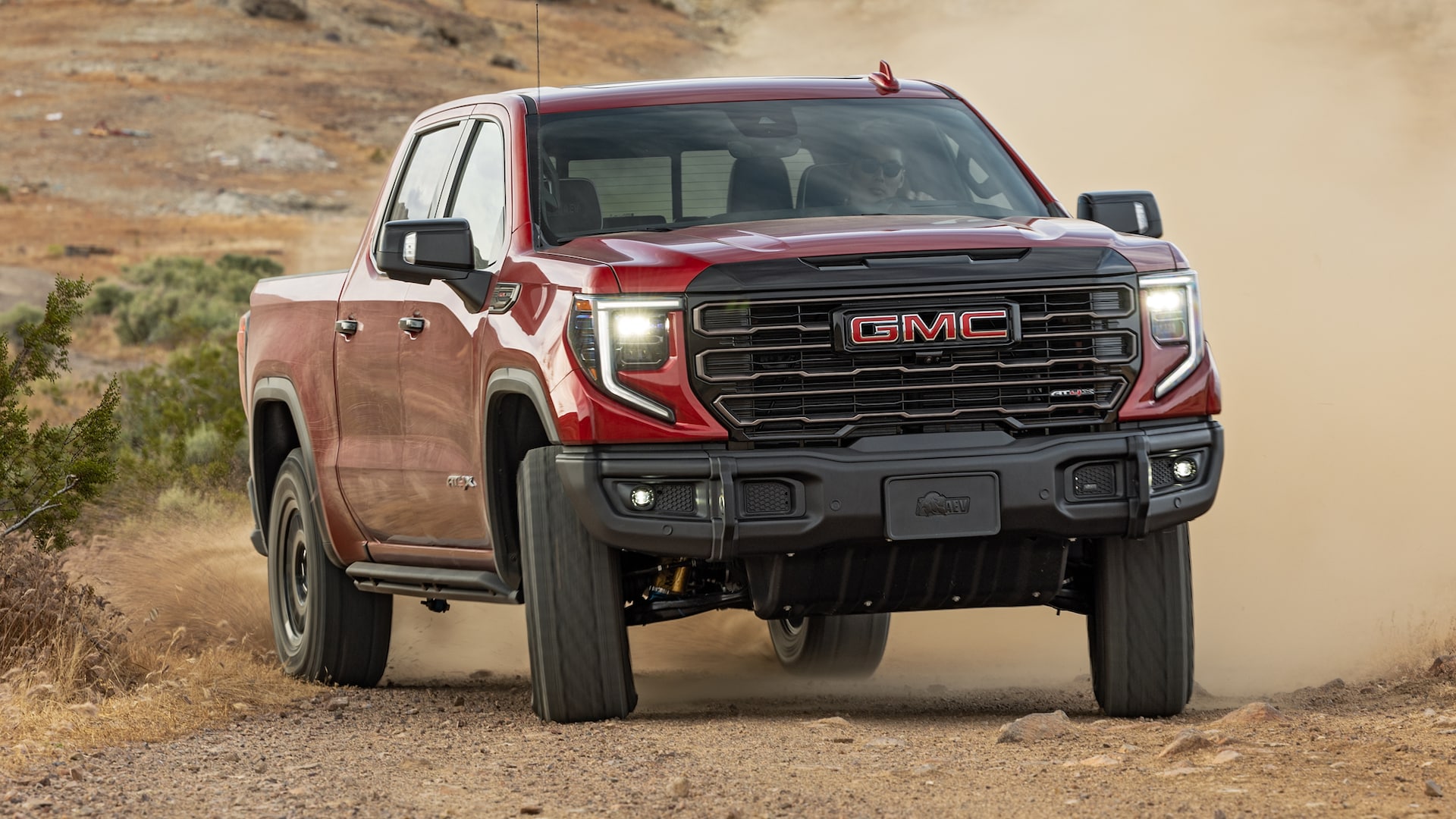 The 2024 GMC Sierra 1500 off-roading in sand