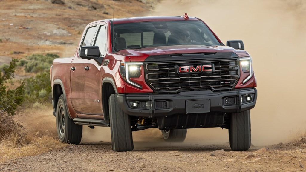 The 2024 GMC Sierra 1500 off-roading in sand