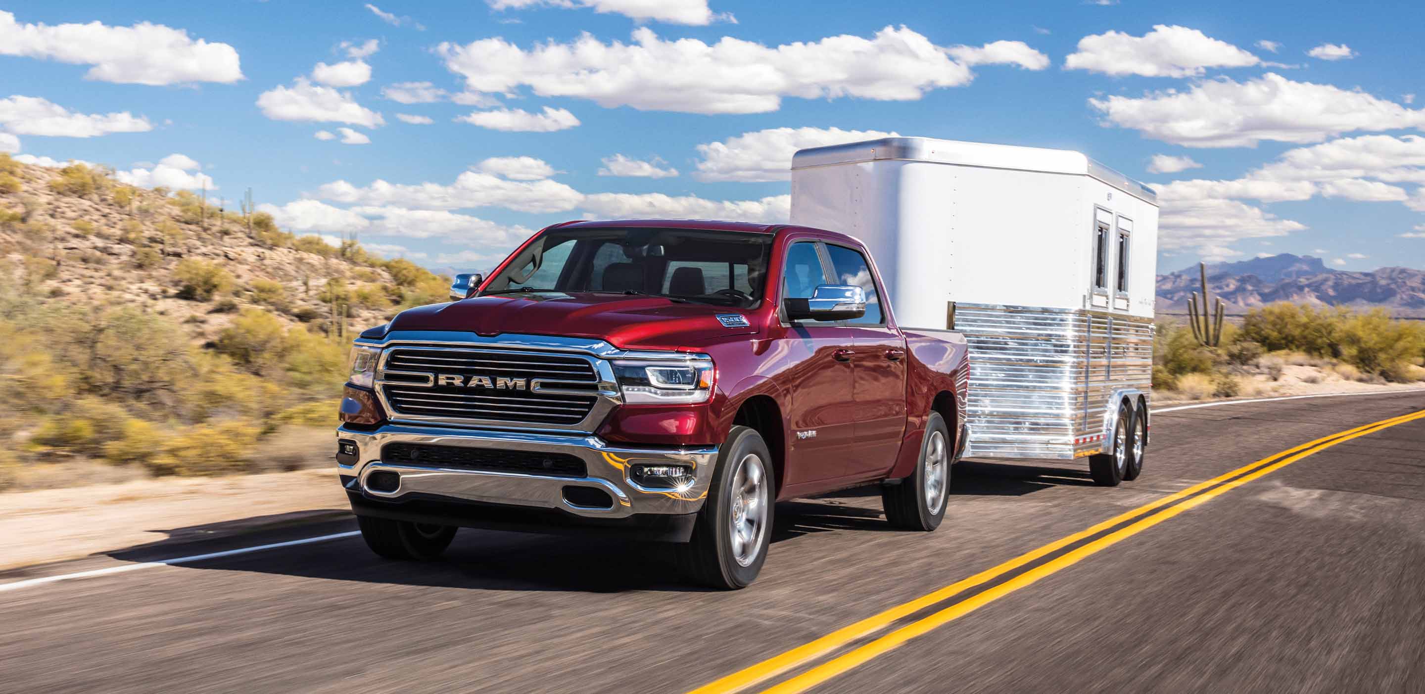 The 2024 Ram 1500 pulling a trailer 