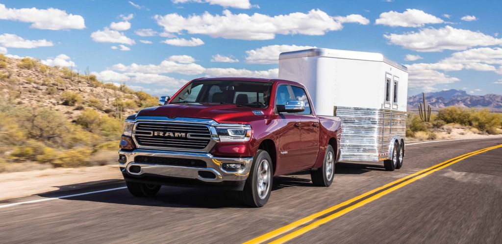 The 2024 Ram 1500 pulling a trailer