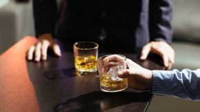 A couple of would-be drivers risk a DUI by drinking before driving.