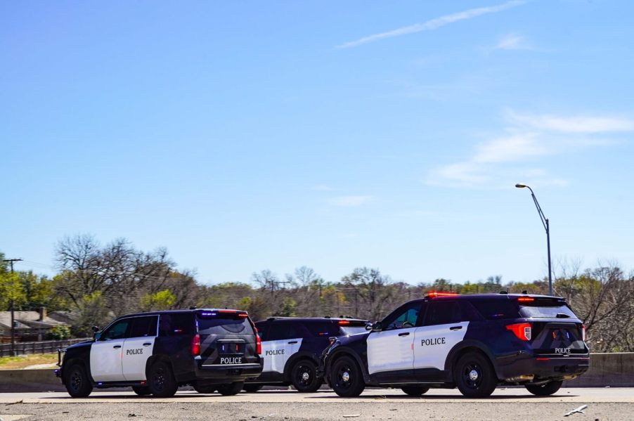 Police cars and SUVs respond to a hit-and-run accident.