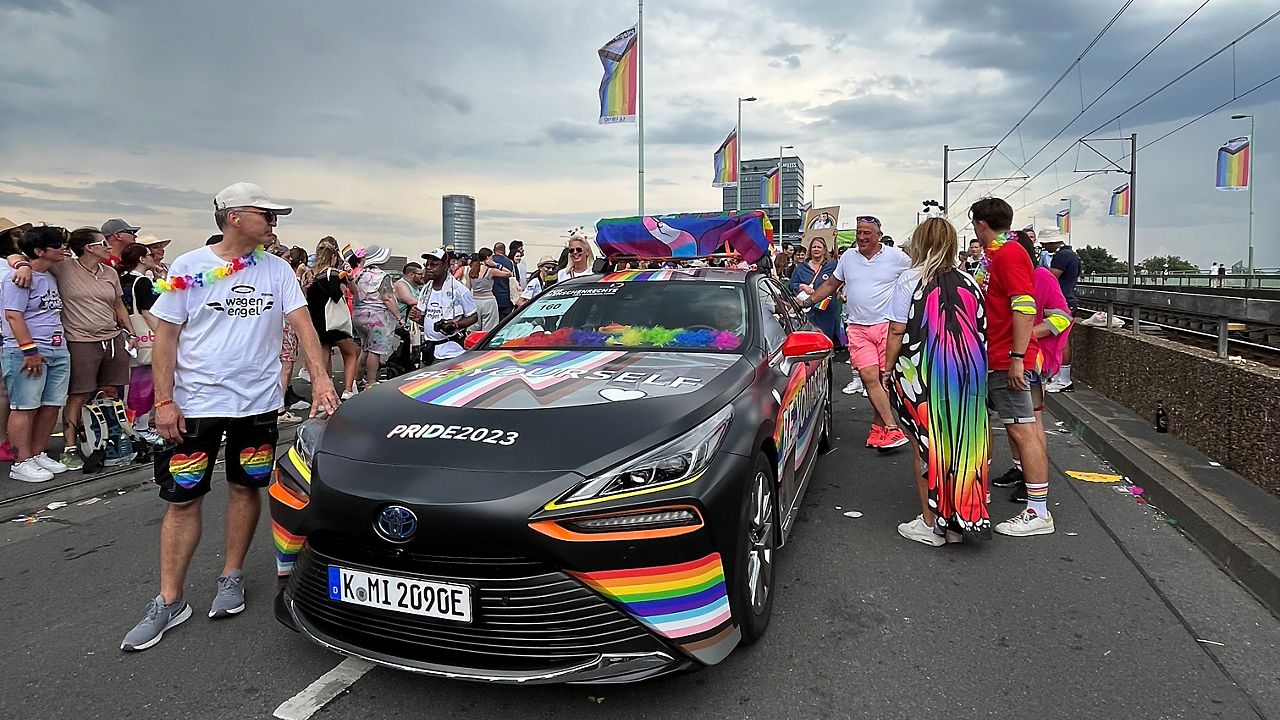 A Toyota Mirai at a pride event