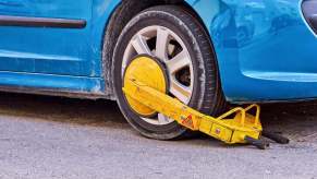 A driver may wonder how to remove a boot like this one from their car.