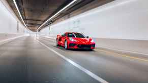 A red Chevrolet Corvette driving in a tunnel the car is considered one of the deadliest cars in the U.S. according to data shared in 2024