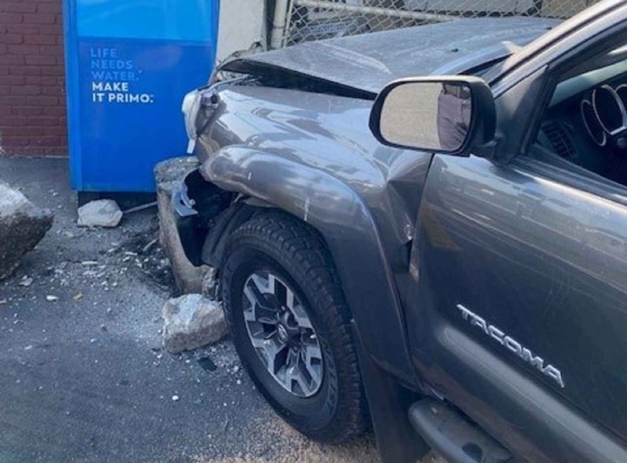 A Toyota Tacoma operated by a drunk driver in Santa Rosa, California after crashing into a grocery store in September 2023 damage to front end