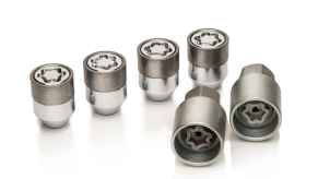 Six locking wheel nut keys for a car on a white background