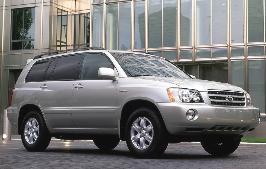 Silver Toyota Highlander Hybrid crossover suv