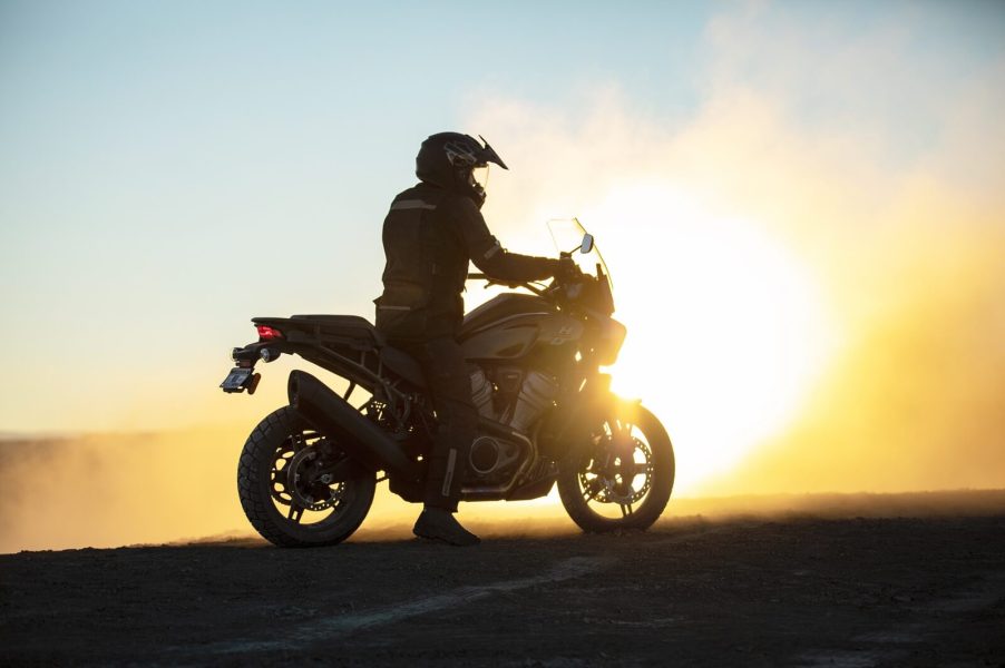 A Harley-Davidson Pan America cast in shadow.