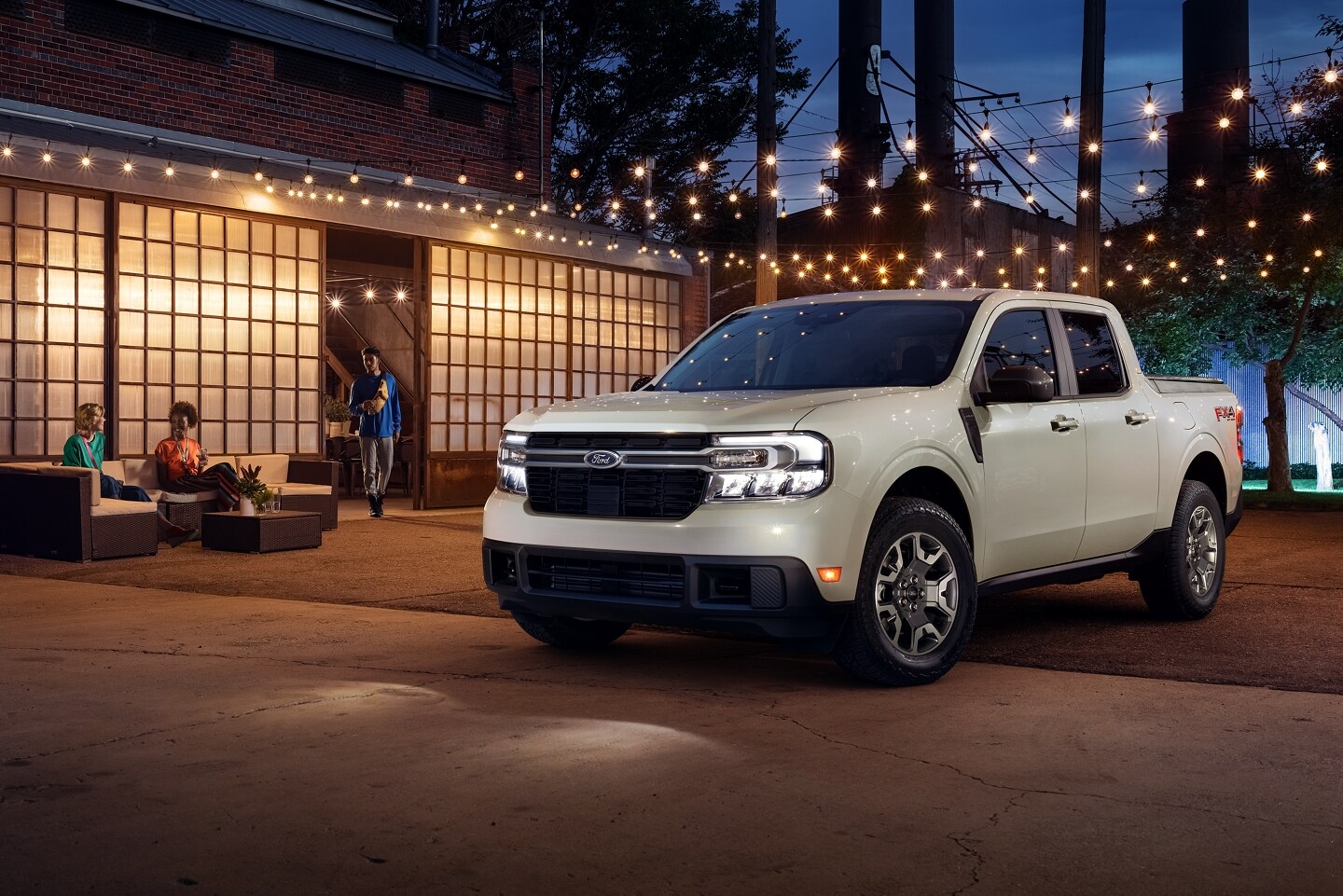 The 2024 Ford Maverick parked by a home
