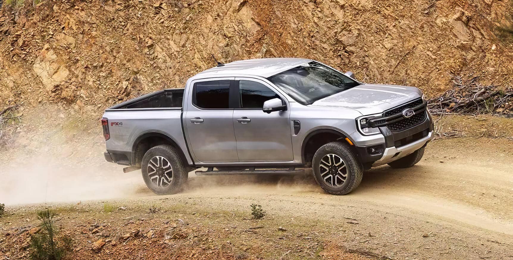 The 2024 Ford Ranger on a dirt trail
