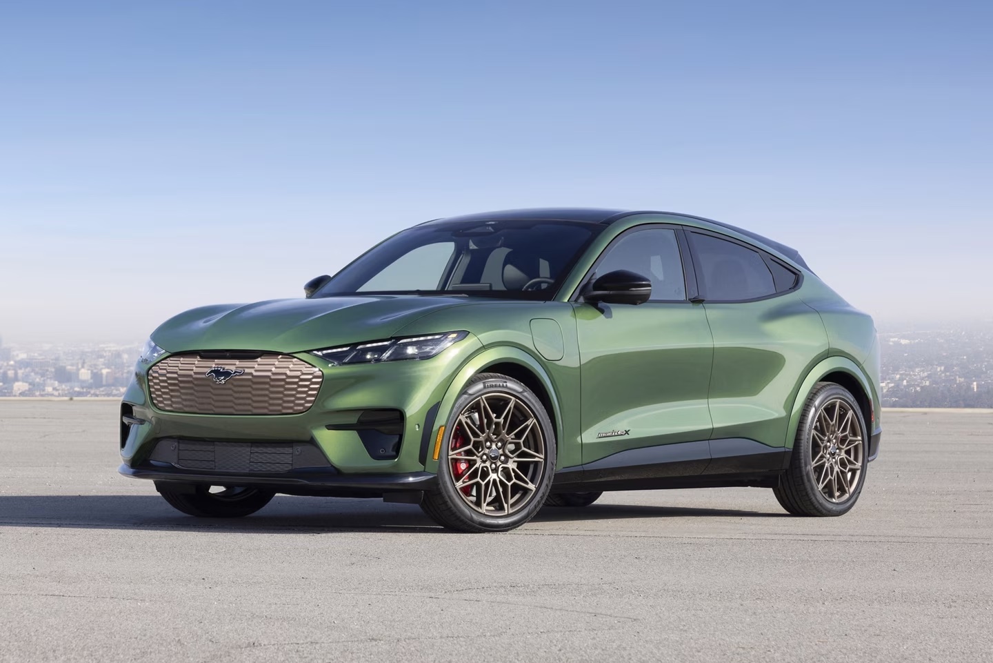 The 2024 Ford mustang Mach-E near a city view