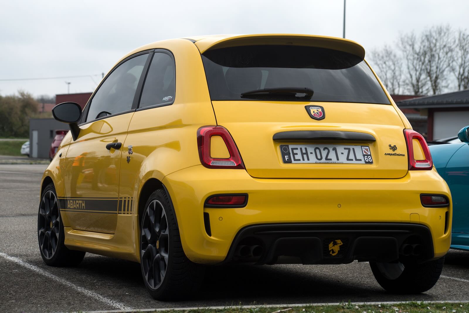 Bright yellow Fiat 500 Abarth hot hatch Rear