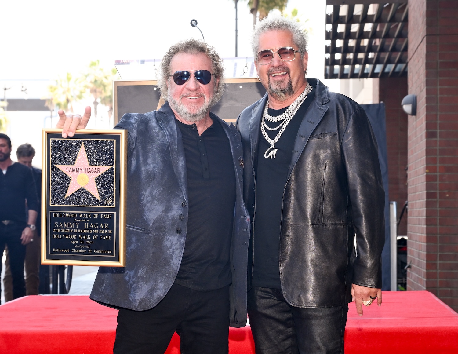 Sammy Hagar and Guy Fieri accepting an award